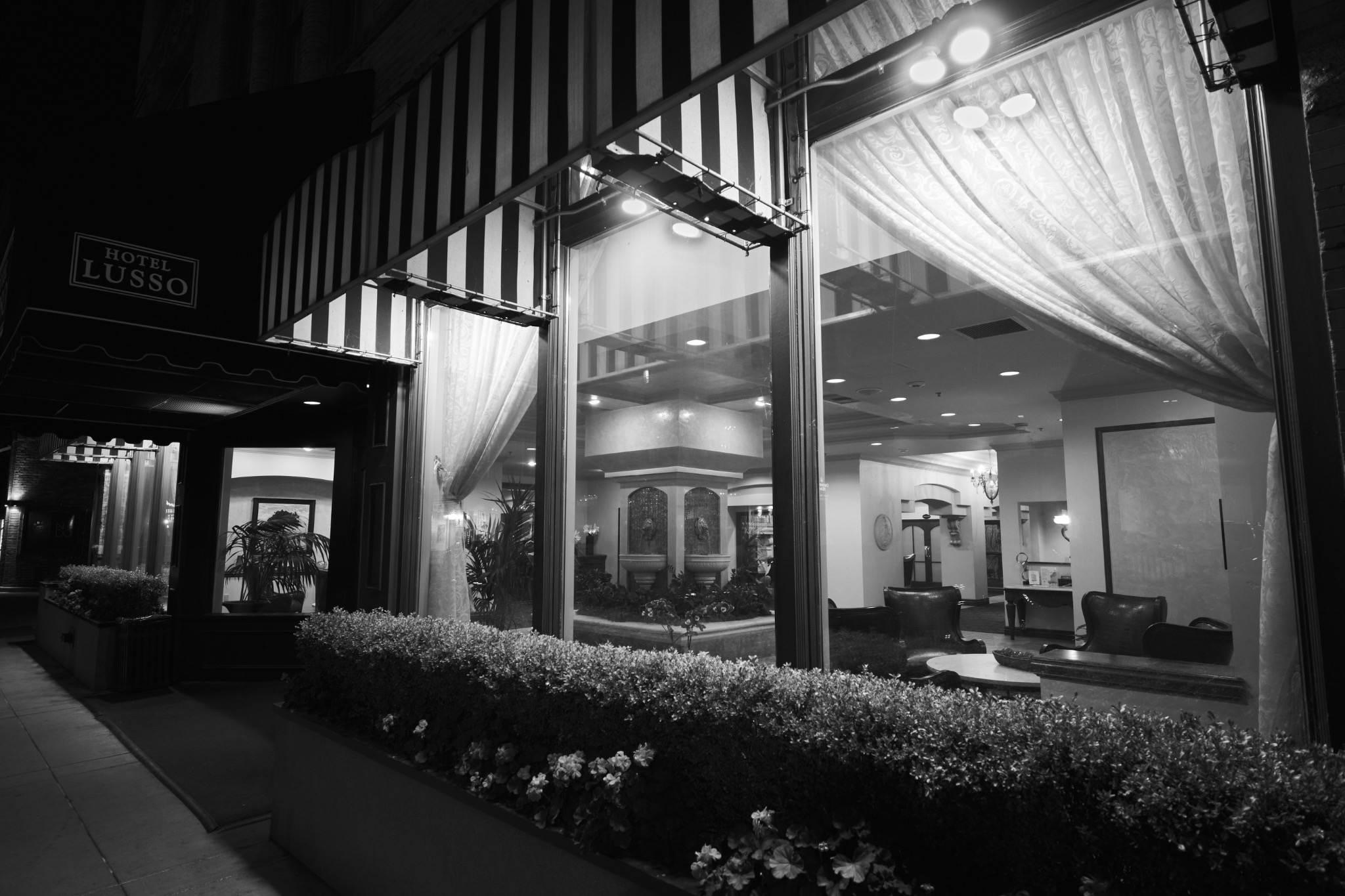Hotel Lusso at night in Spokane, Washington, photographed in black and white