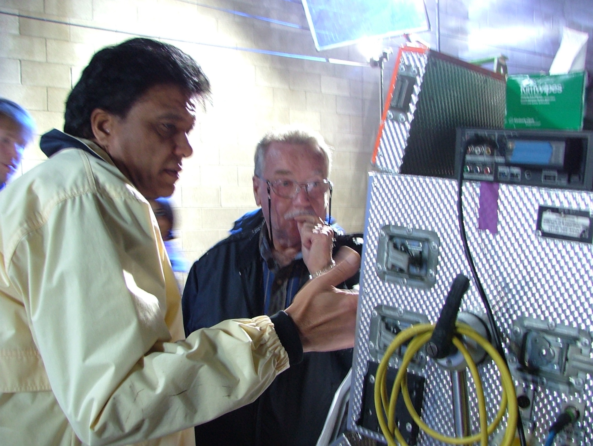 Upinder Raisauda reviewing a shot at a production monitor on The Corner Shop